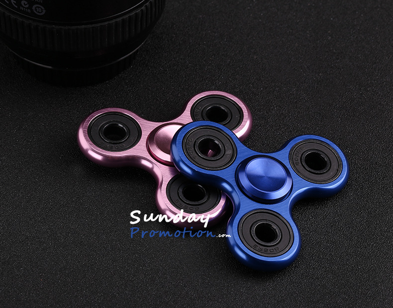 This is a Wholesale Aluminium Finger Spinner Hand Toy Tri-fidget Spinner 9
